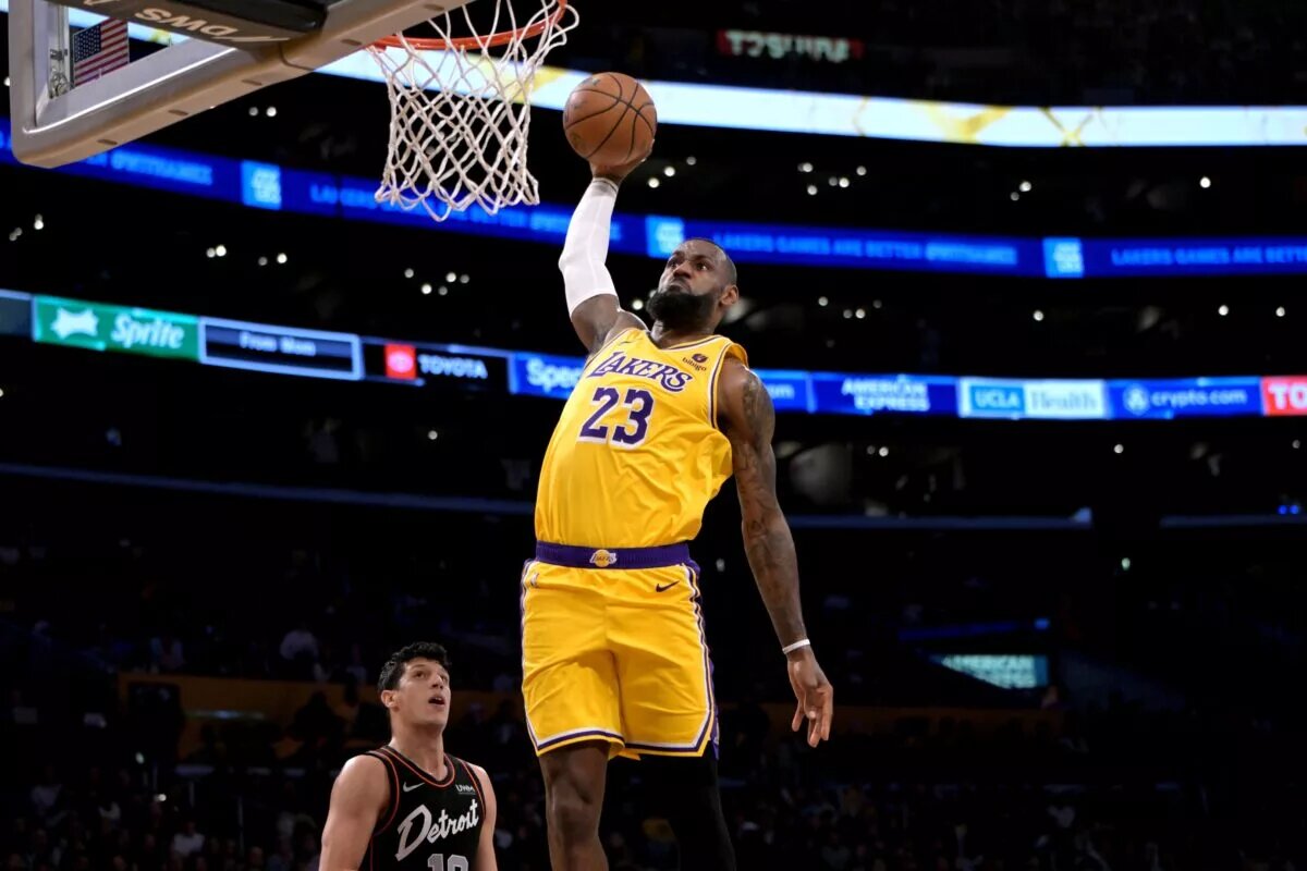 Los Angeles Lakers forward LeBron James (23) goes up for a dunk in the first half against the Detroit Pistons at Crypto.com Arena.