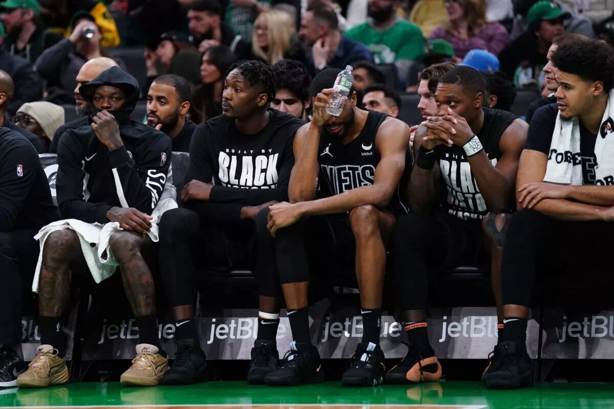 The Brooklyn Nets bench looks on as they take on the Boston Celtics in the second half at TD Garden.