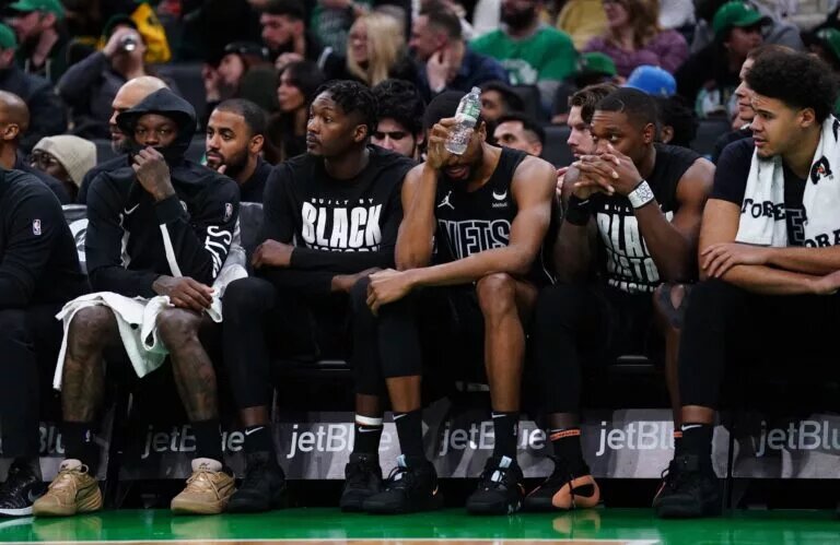 The Brooklyn Nets bench looks on as they take on the Boston Celtics in the second half at TD Garden.