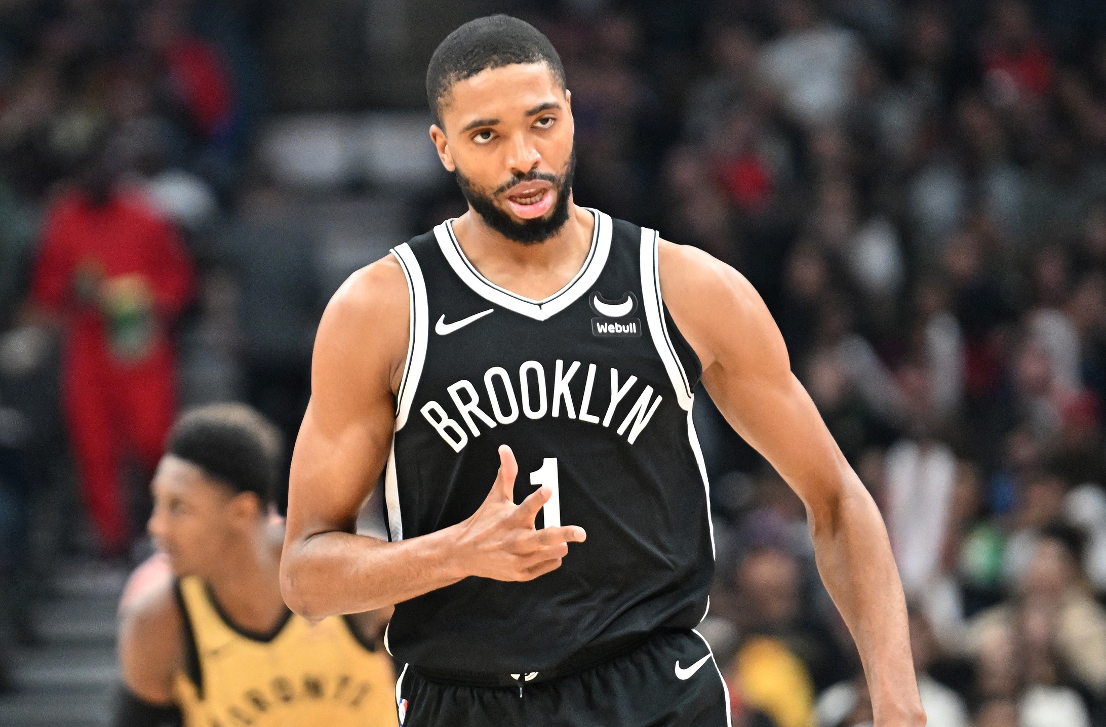 Brooklyn Nets guard Mikal Bridges (1) reacts after making a three point basket against the Toronto Raptors in the first half at Scotiabank Arena.