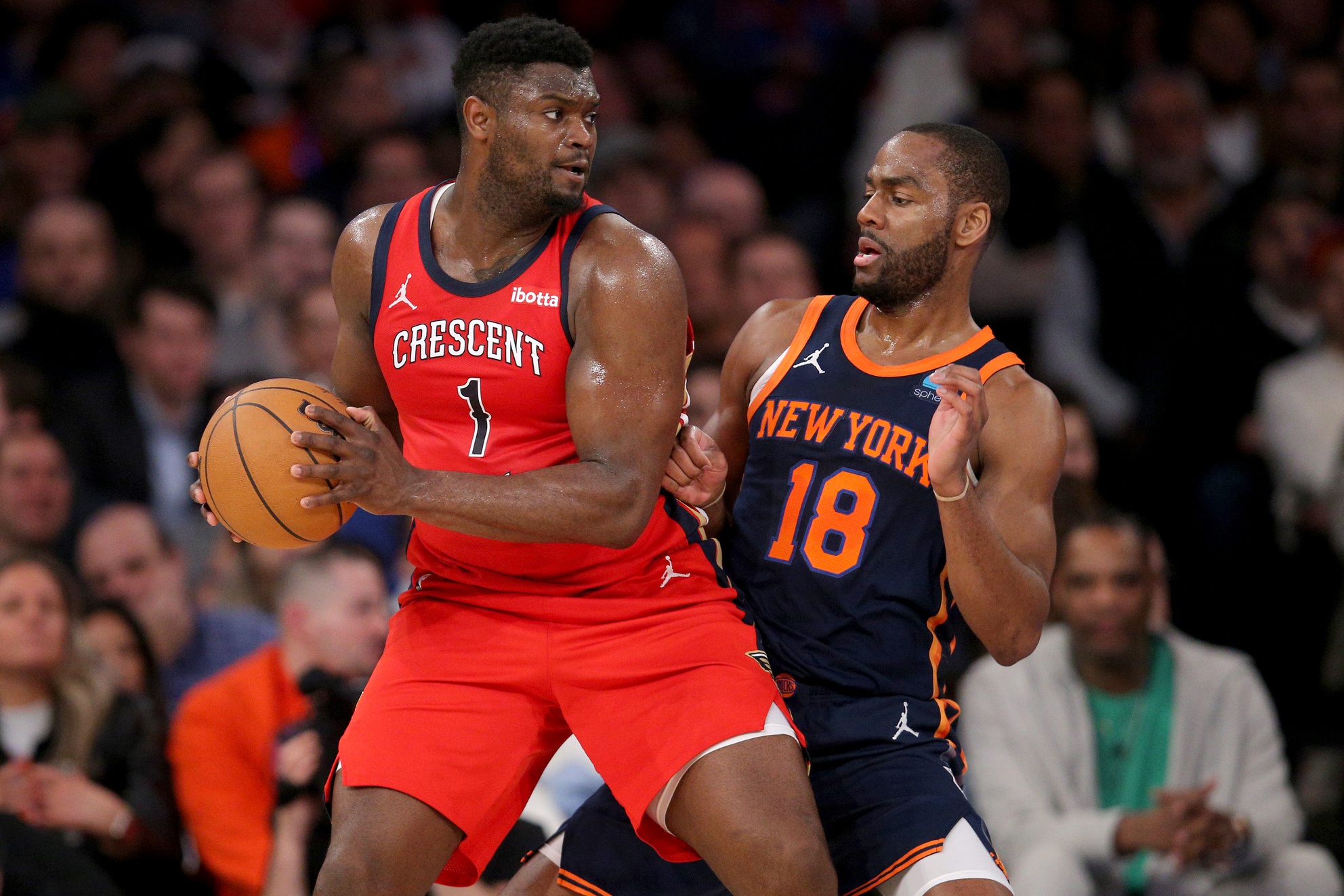New Orleans Pelicans forward Zion Williamson (1) controls the ball against New York Knicks guard Alec Burks (18) during the second quarter at Madison Square Garden.