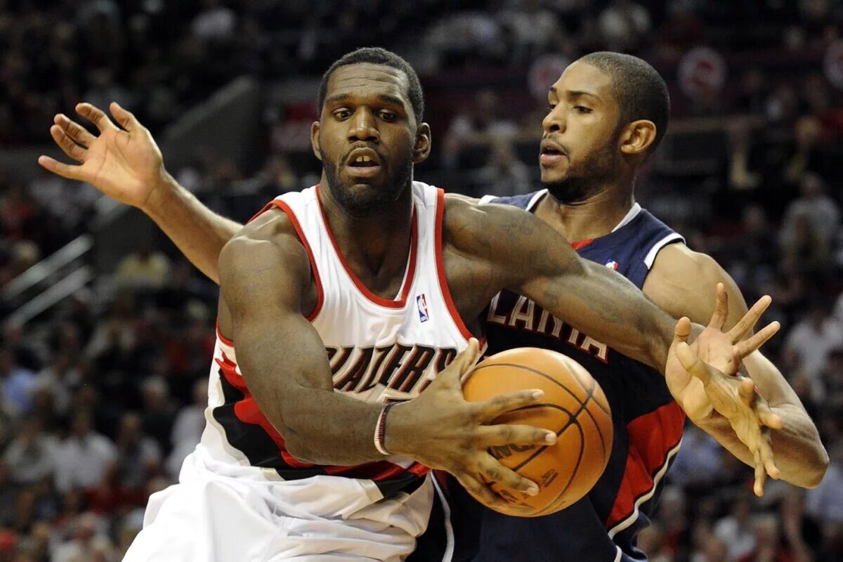 Nov. 3, 2009; Portland, OR, USA; Portland Trailblazers center Greg Oden (52) drives to the basket on Atlanta Hawks center Al Horford (15) in the fourth quarter of the game at the Rose Garden. Atlanta won the game 97-91. Mandatory Credit: Steve Dykes-USA TODAY Sports