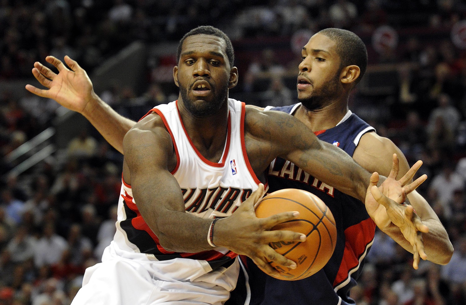 Nov. 3, 2009; Portland, OR, USA; Portland Trailblazers center Greg Oden (52) drives to the basket on Atlanta Hawks center Al Horford (15) in the fourth quarter of the game at the Rose Garden. Atlanta won the game 97-91. Mandatory Credit: Steve Dykes-USA TODAY Sports