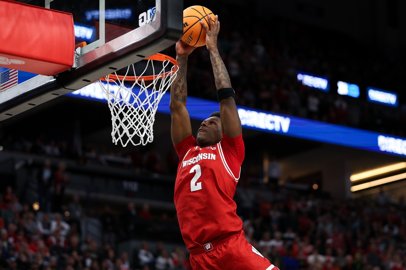 Wisconsin Badgers guard AJ Storr (2) dunks against the Purdue Boilermakers during the overtime at Target Center. Mandatory Credit: Matt Krohn-USA TODAY Sports