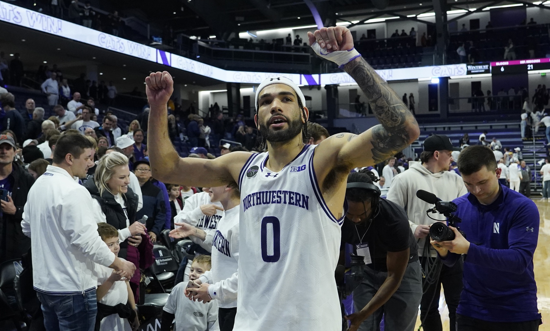 Northwestern Wildcats guard Boo Buie (0) celebrates the Wildcats win against the Minnesota Golden Gophers at Welsh-Ryan Arena. Mandatory Credit: David Banks-USA TODAY Sports