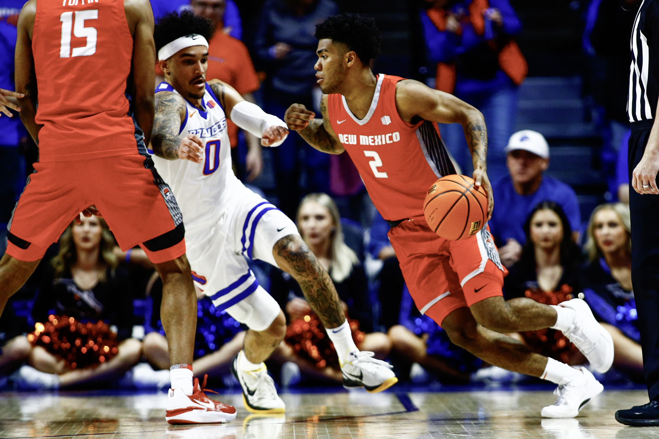 New Mexico Lobos guard Donovan Dent (2) drives as Boise State Broncos guard Roddie Anderson III (0) is screened by forward JT Toppin (15) during the second half aat ExtraMile Arena. Boise State defeats New Mexico 89-79. Mandatory Credit: Brian Losness-USA TODAY Sports