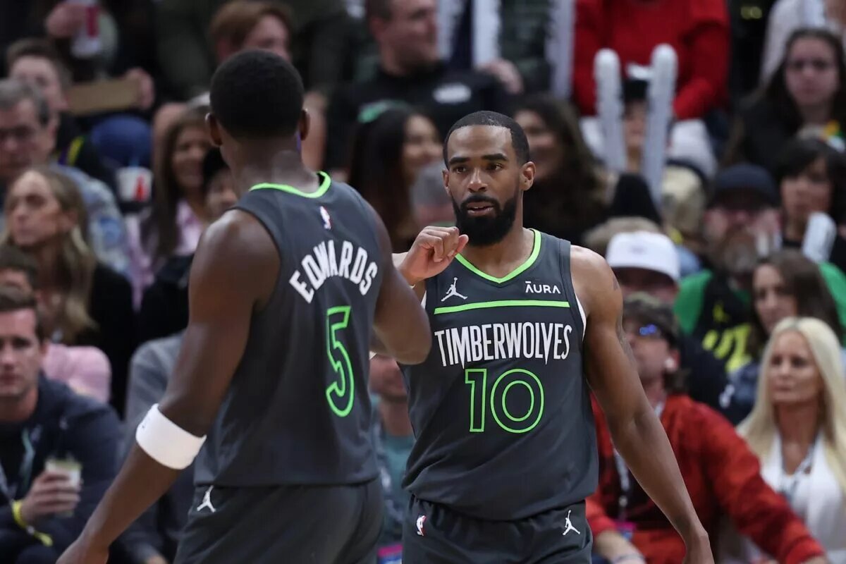 Anthony Edwards and Mike Conley of the Minnesota Timberwolves