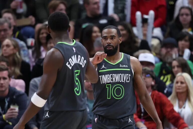 Anthony Edwards and Mike Conley of the Minnesota Timberwolves
