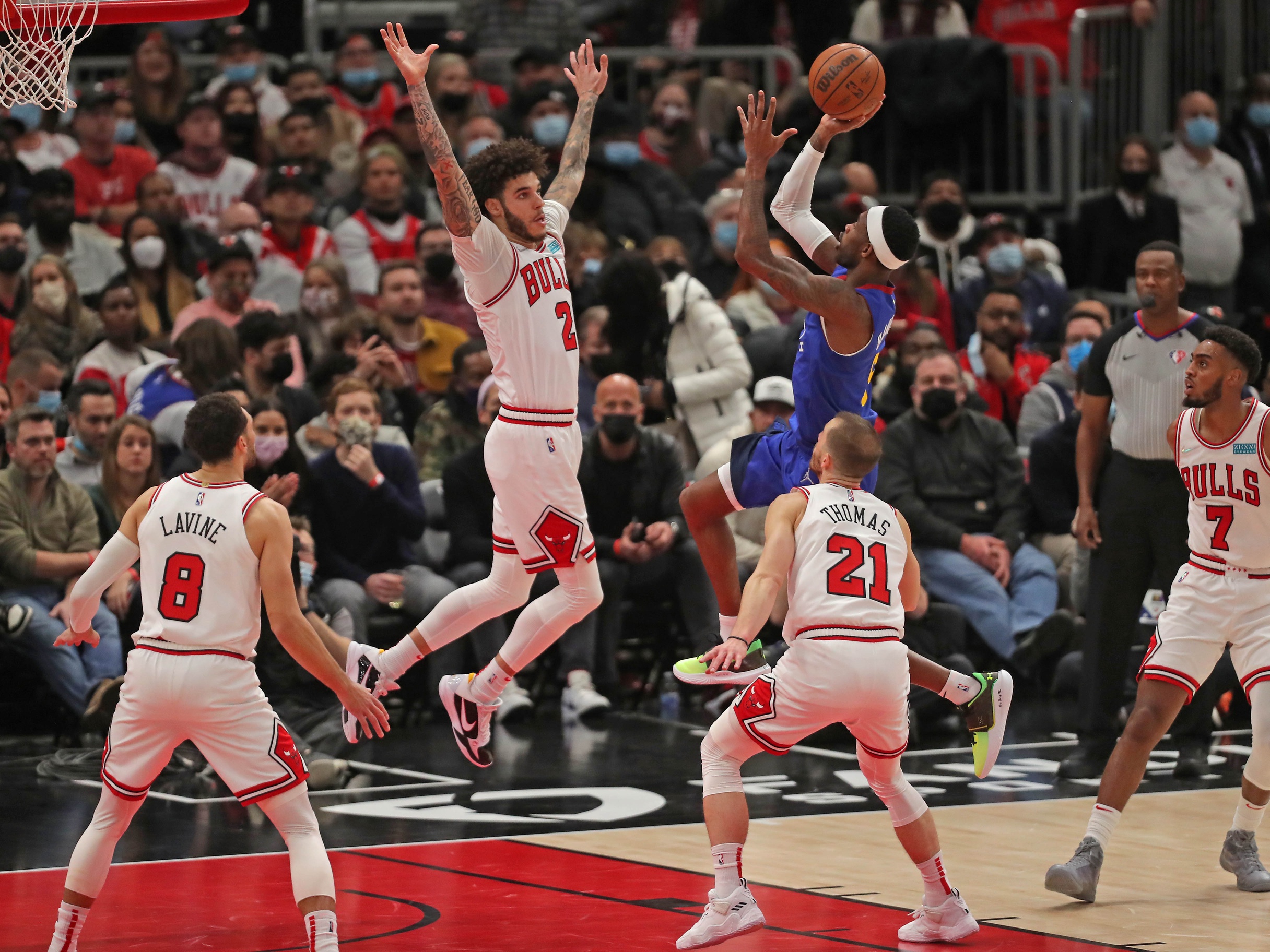 Chicago Bulls guard Lonzo Ball attempts block