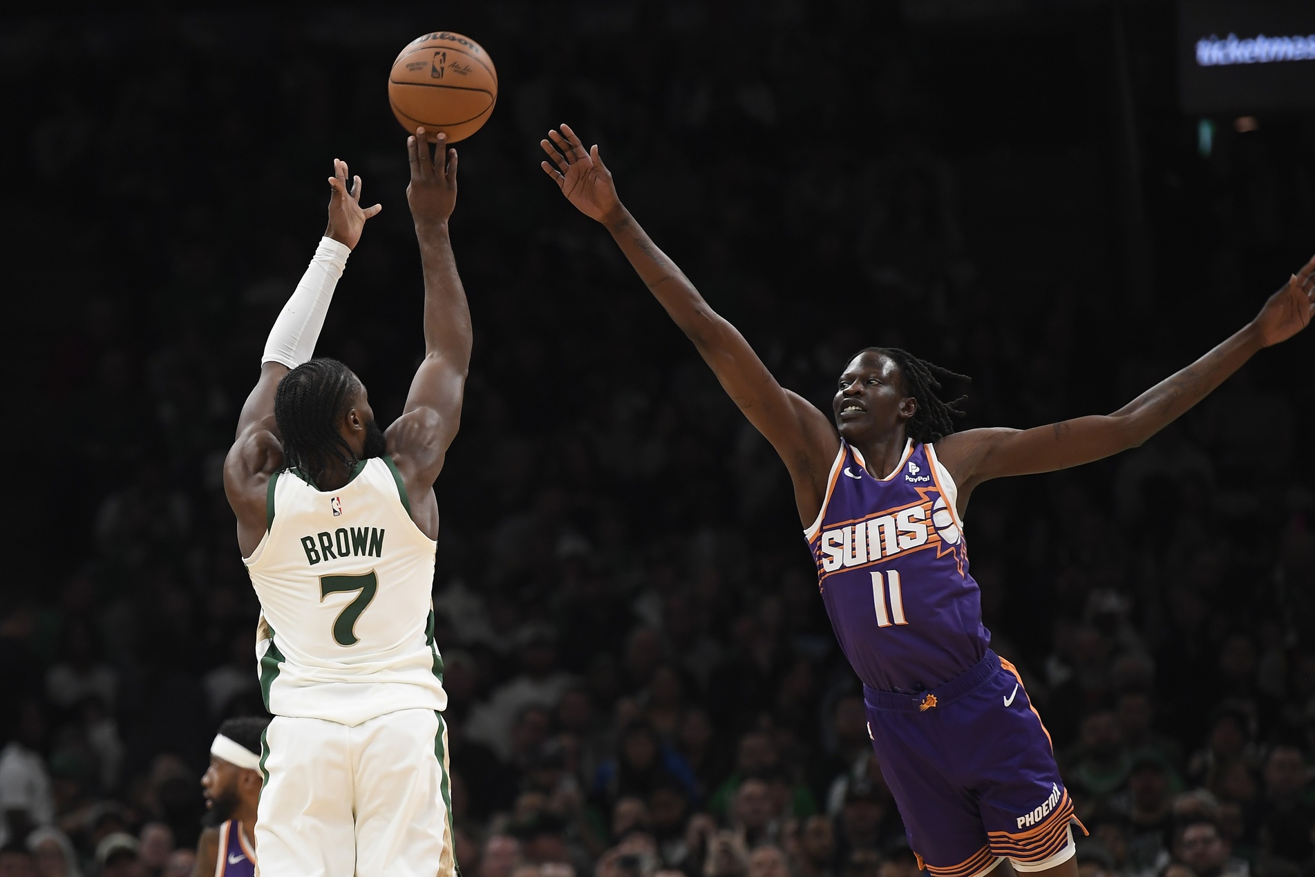 Boston Celtics wing Jaylen Brown shoots over Phoenix Suns forward Bol Bol