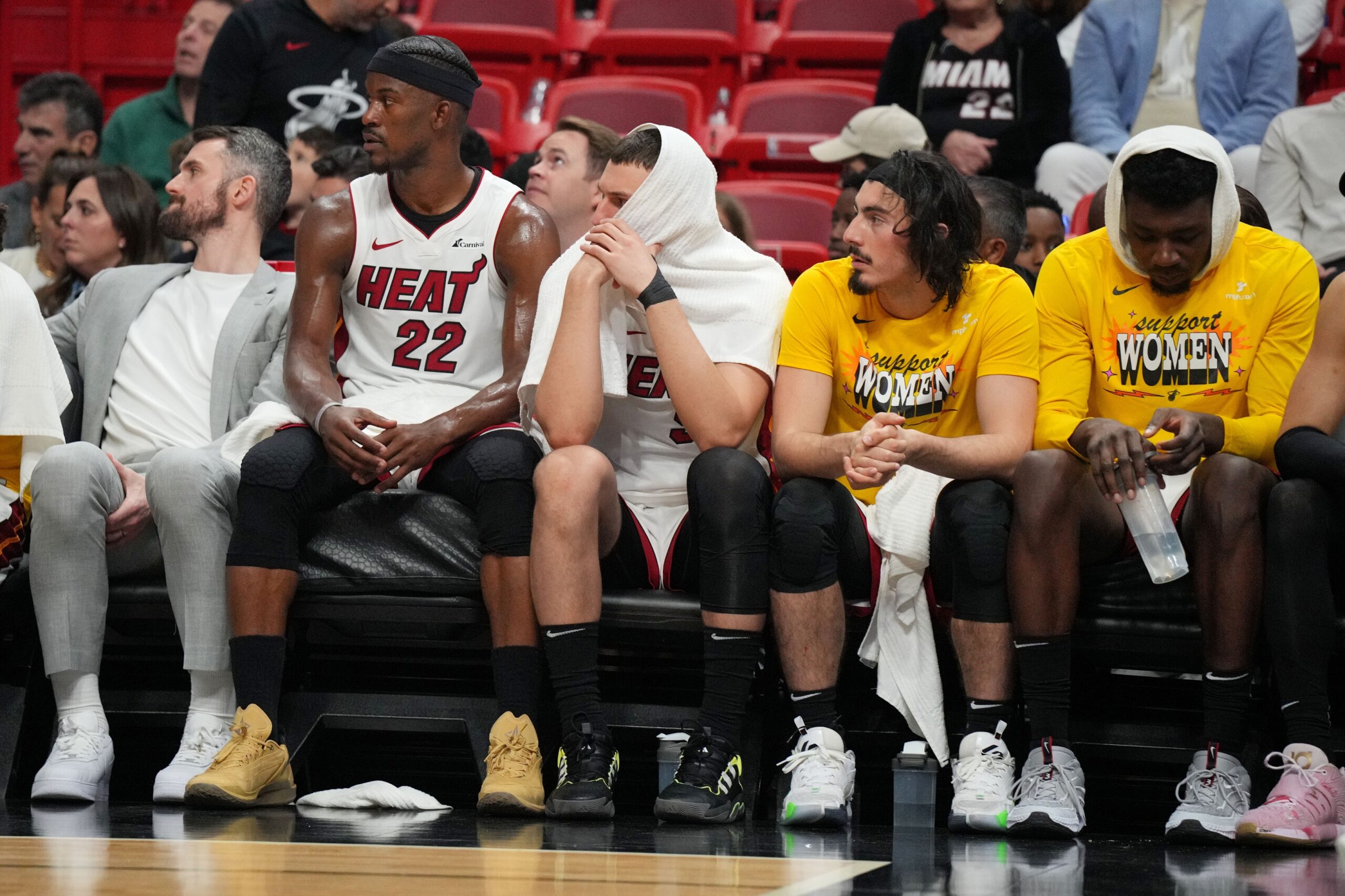 Jimmy Butler and rookie Jaime Jaquez Jr. on the Miami Heat bench