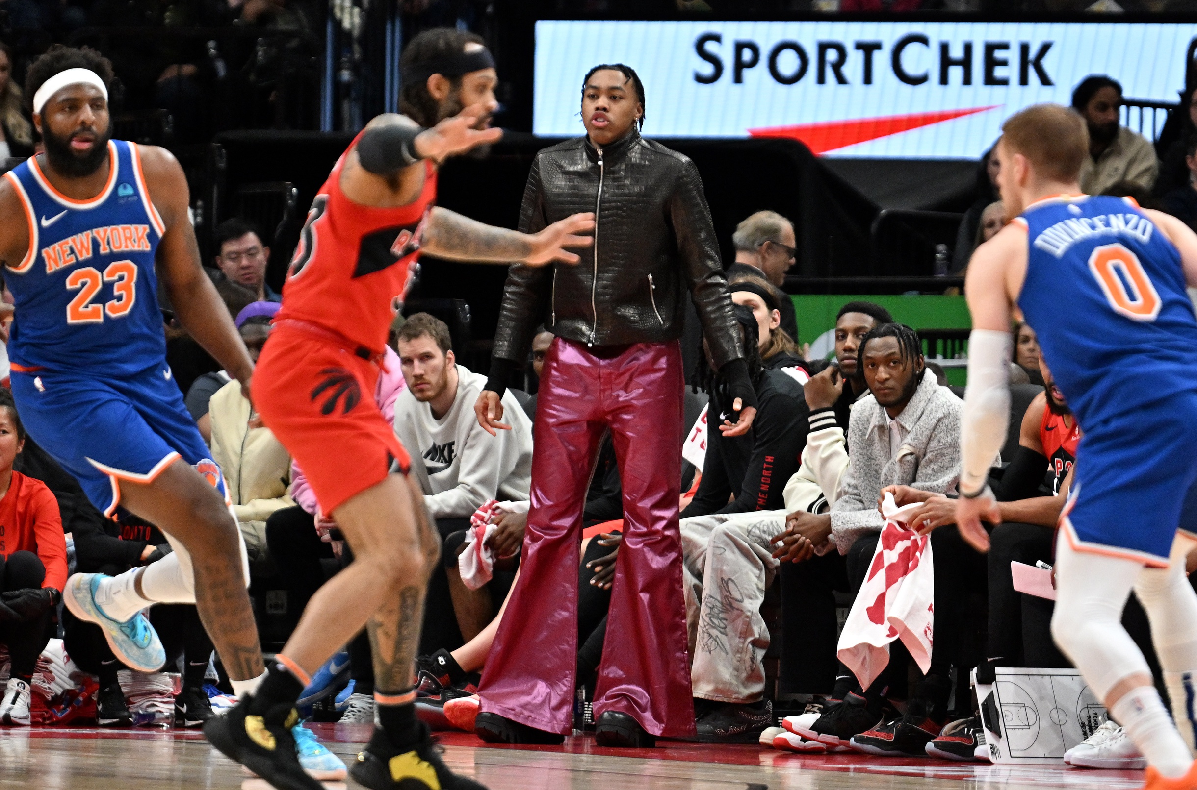 Toronto Raptors forward Scottie Barnes watches team from bench as he recovers from injury
