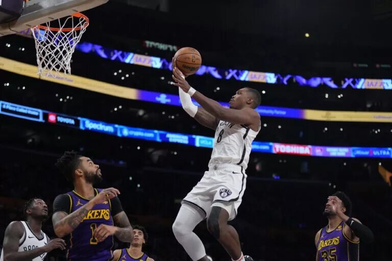 Brooklyn Nets scorer Lonnie Walker IV goes up for layup against Los Angeles Lakers