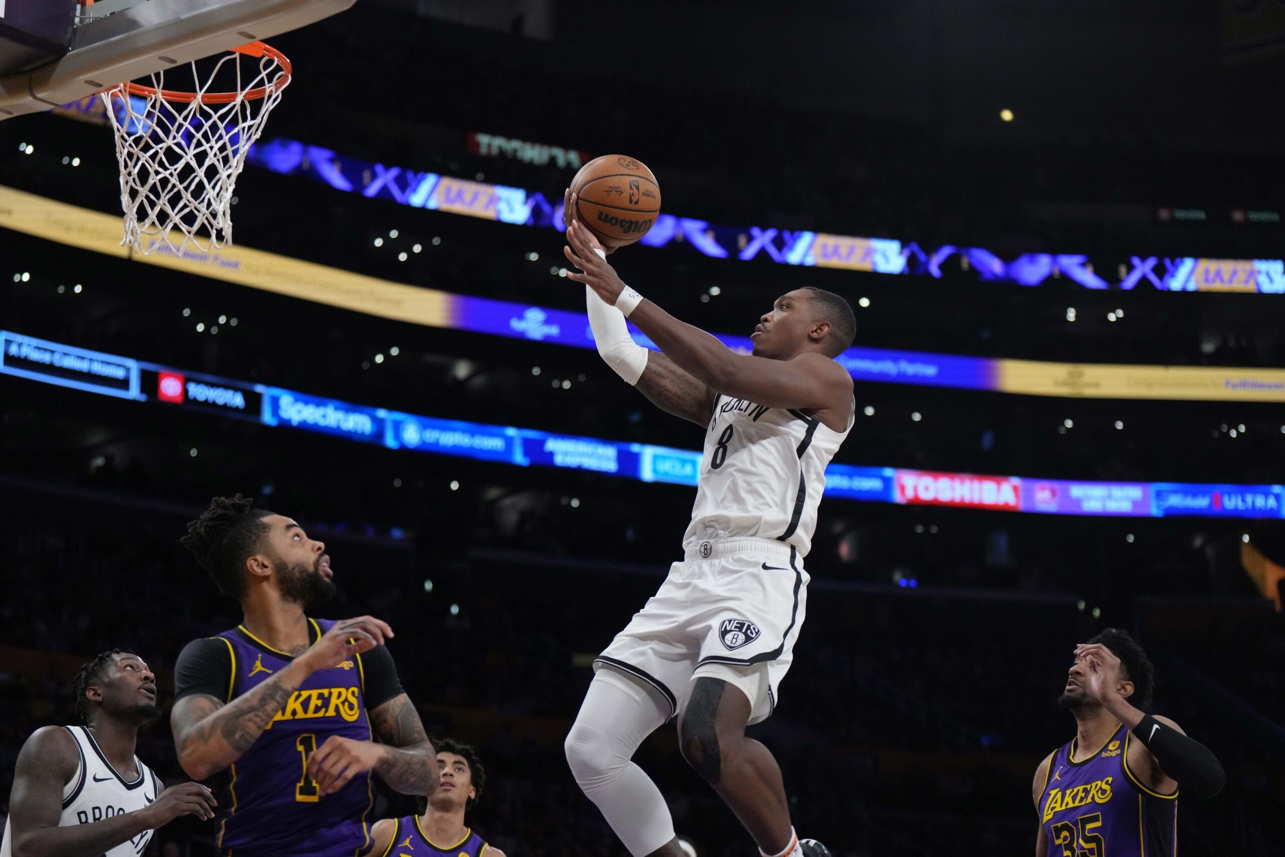 Brooklyn Nets scorer Lonnie Walker IV goes up for layup against Los Angeles Lakers