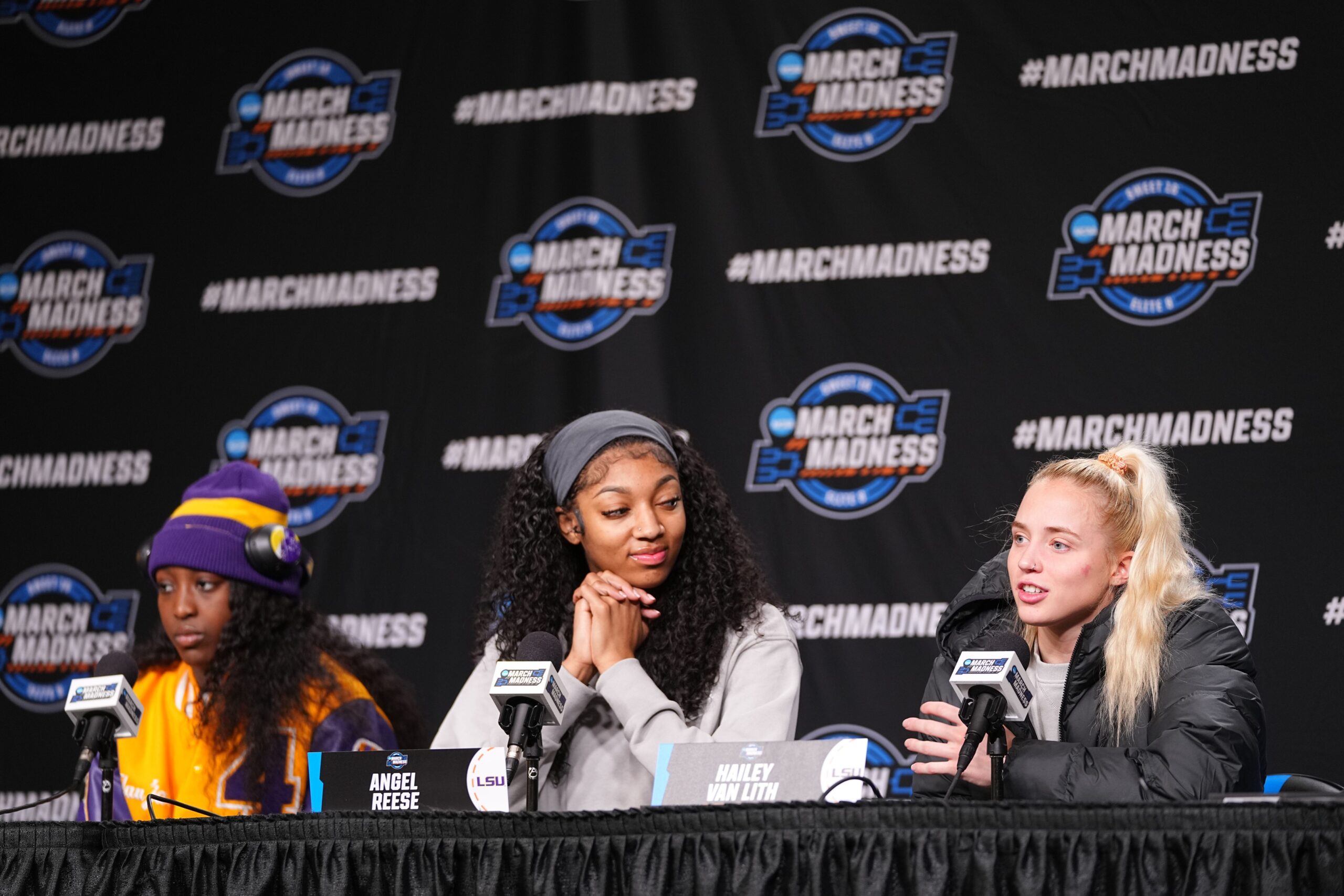 LSU women's basketball players Hailey Van Lith, Angel Reese, and Flau'jae Johnson