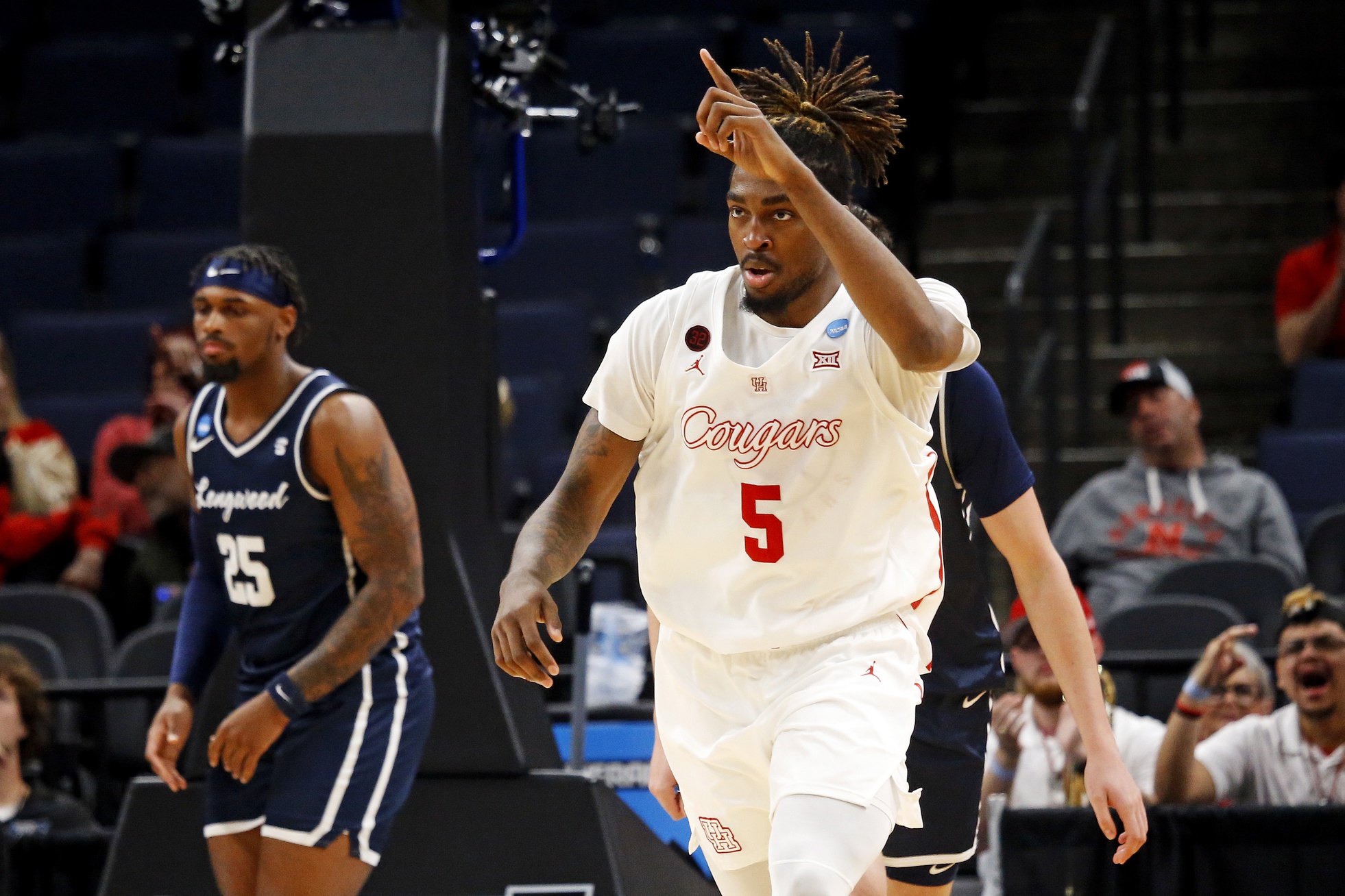 Houston Cougars forward Ja'Vier Francis (5) celebrates after a play during the second half of the game against the Longwood Lancers in the first round of the 2024 NCAA Tournament at FedExForum. Mandatory Credit: Petre Thomas-USA TODAY Sports