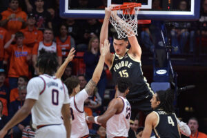 Purdue Boilermakers center Zach Edey (15) dunks the ball during the first half against the Illinois Fighting Illini at State Farm Center. Mandatory Credit: Ron Johnson-USA TODAY Sports