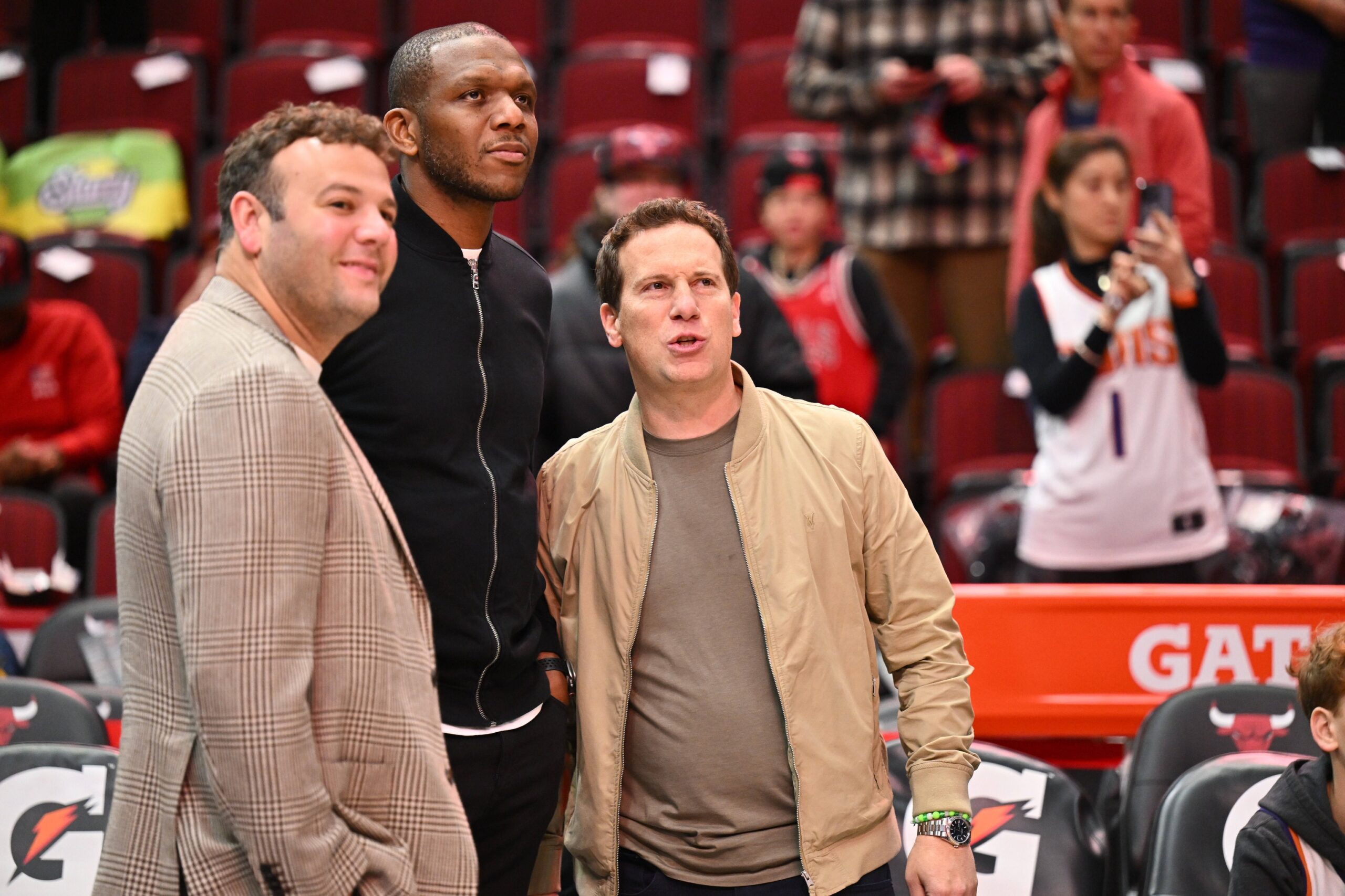 Nov 8, 2023; Chicago, Illinois, USA; Phoenix Suns general manager James Jones, center, and owner Matt Ishbia, right, watch their team warms up before a game against the Chicago Bulls at United Center. Mandatory Credit: Jamie Sabau-USA TODAY Sports