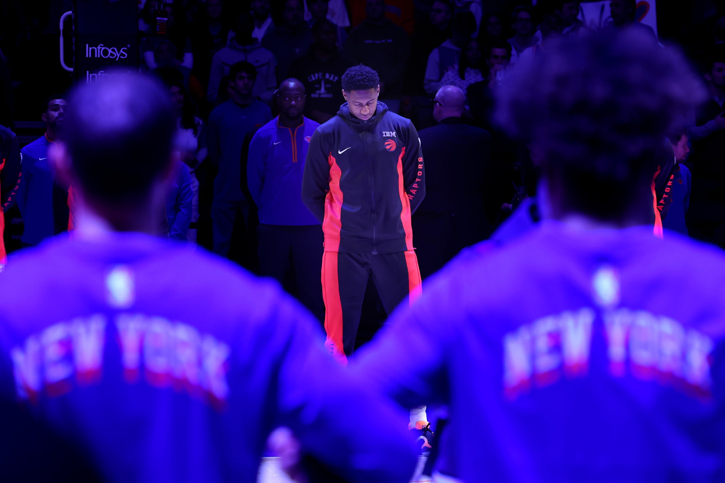 Raptors wing RJ Barrett in front of Knicks players pre-game