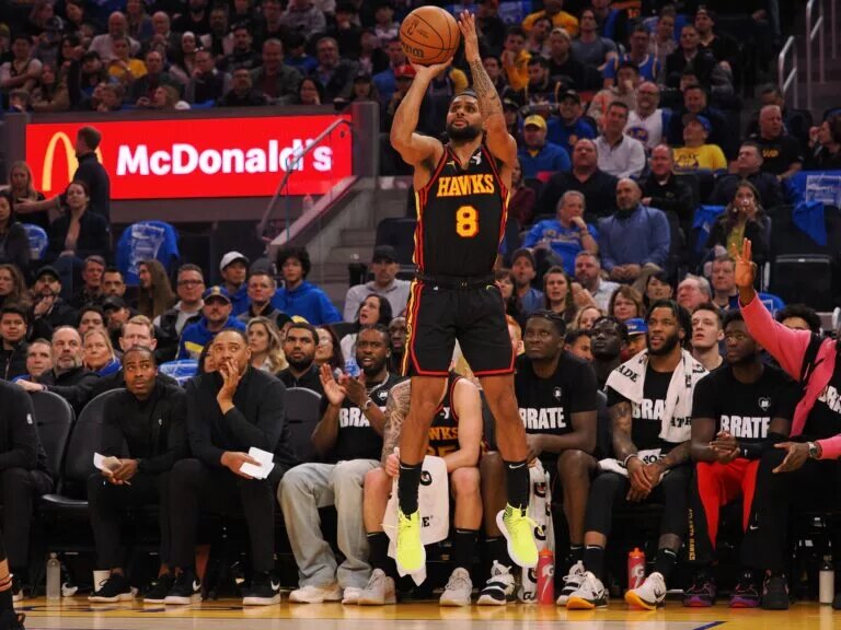 Jan 24, 2024; San Francisco, California, USA; Atlanta Hawks guard Patty Mills (8) scores a three point basket against the Golden State Warriors during the second quarter at Chase Center. Mandatory Credit: Kelley L Cox-USA TODAY Sports