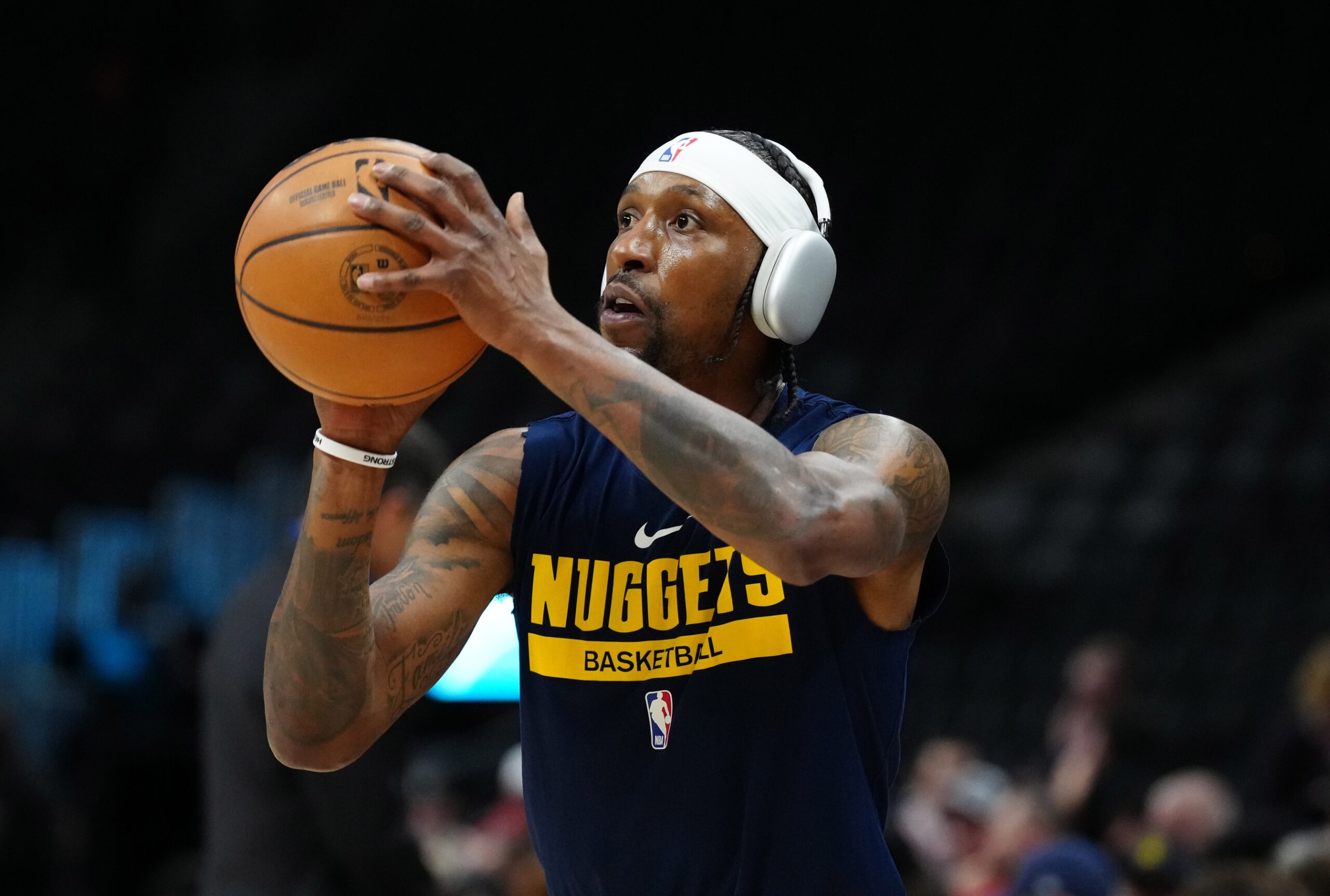 Feb 14, 2024; Denver, Colorado, USA; Denver Nuggets guard Kentavious Caldwell-Pope (5) warms up before the game against the Sacramento Kings at Ball Arena. Mandatory Credit: Ron Chenoy-USA TODAY Sports