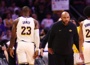 Feb 25, 2024; Phoenix, Arizona, USA; Los Angeles Lakers head coach Darvin Ham with forward LeBron James (23) against the Phoenix Suns at Footprint Center. Mandatory Credit: Mark J. Rebilas-USA TODAY Sports