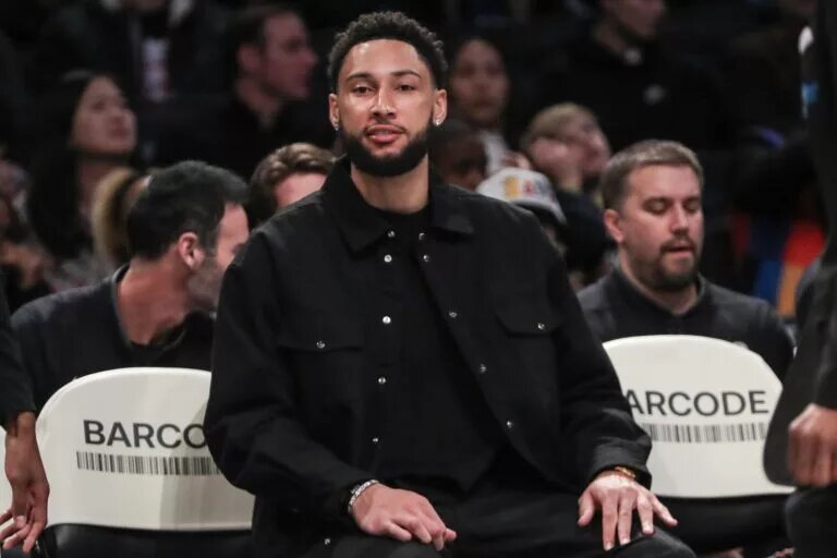 Brooklyn Nets guard Ben Simmons sits on sideline with injury