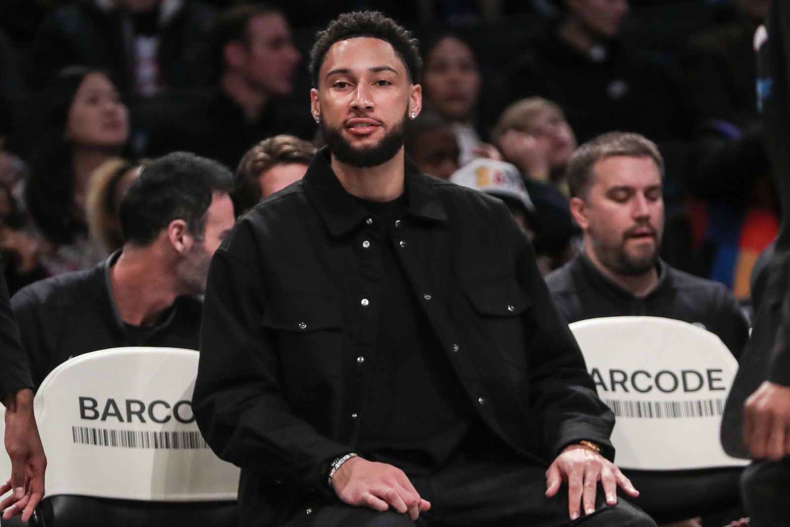 Brooklyn Nets guard Ben Simmons sits on sideline with injury