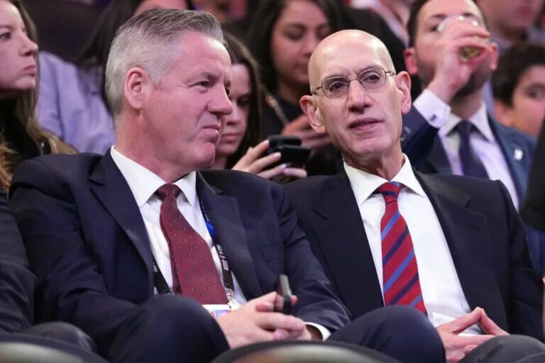 NBA commissioner Adam Silver (right) looks on during the second half of the game between the Phoenix Suns and the Toronto Raptors at Footprint Center.