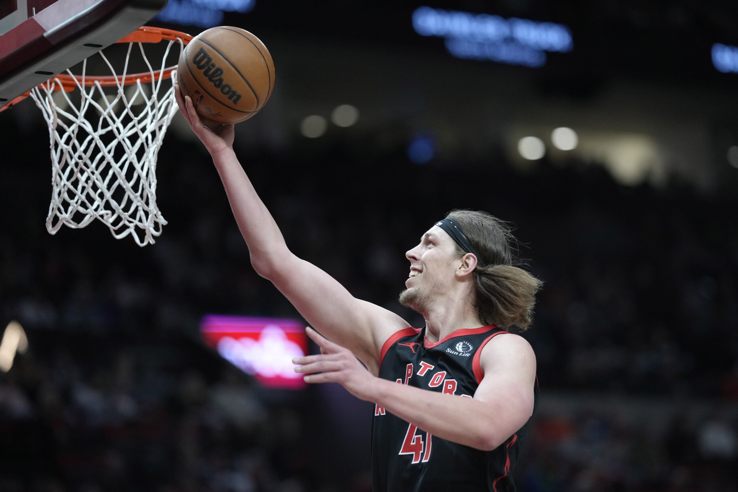 Toronto Raptors power forward Kelly Olynyk (41) shoots the ball during the first half against the Portland Trail Blazers at Moda Center.