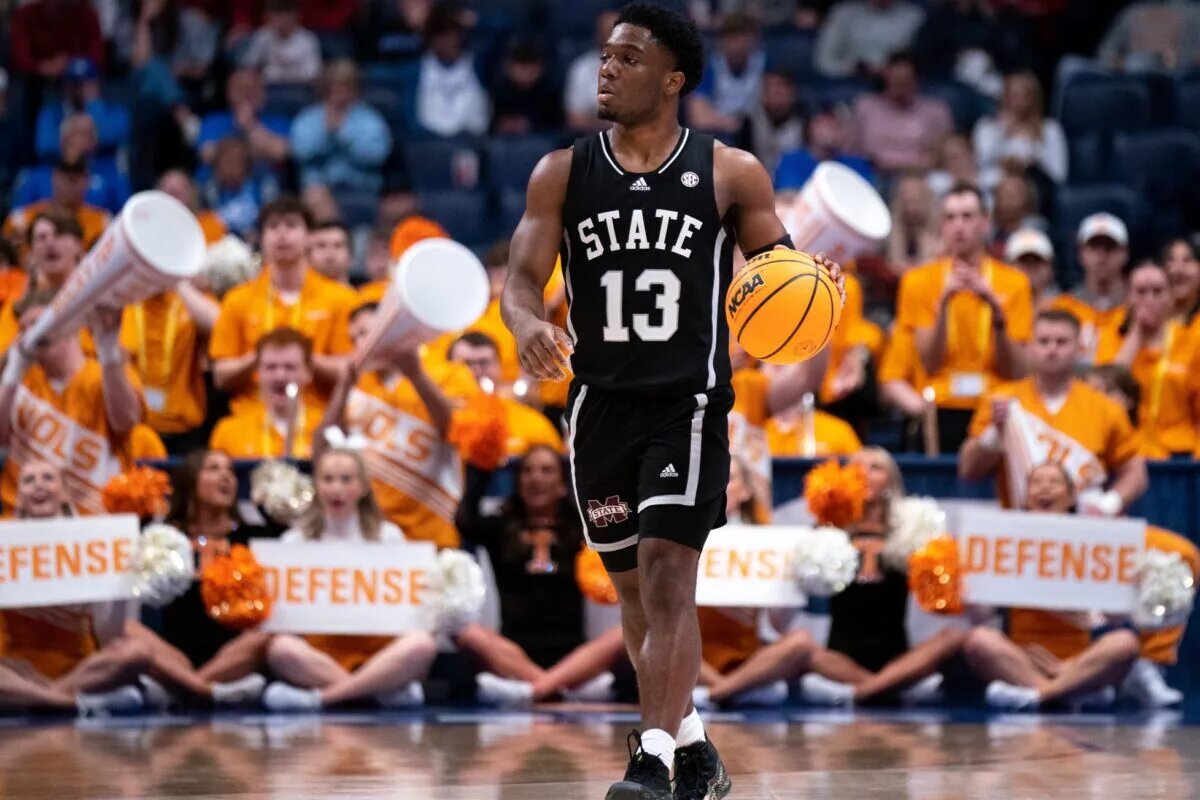 Mississippi State Bulldogs guard Josh Hubbard (13) brings the ball up the court against Tennessee during their SEC Men's Basketball Tournament quarterfinal game at Bridgestone Arena in Nashville