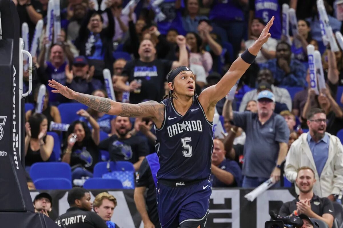 Orlando Magic forward Paolo Banchero (5) reacts after scoring during the second half against the New Orleans Pelicans at KIA Center.