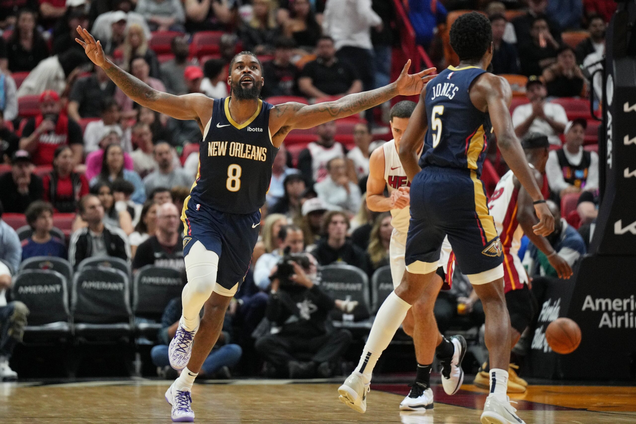 New Orleans Pelicans forward Naji Marshall (8) celebrates a shot against the Miami Heat during the second half at Kaseya Center.