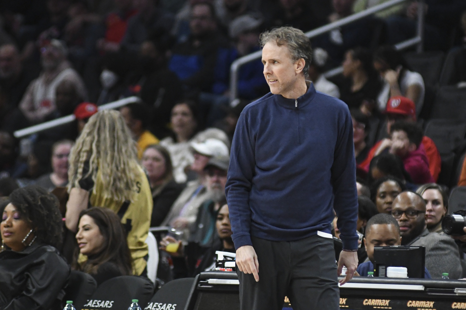 Washington Wizards interim head coach Brian Keefe walks down the sidelines during the first half against the Toronto Raptors at Capital One Arena.