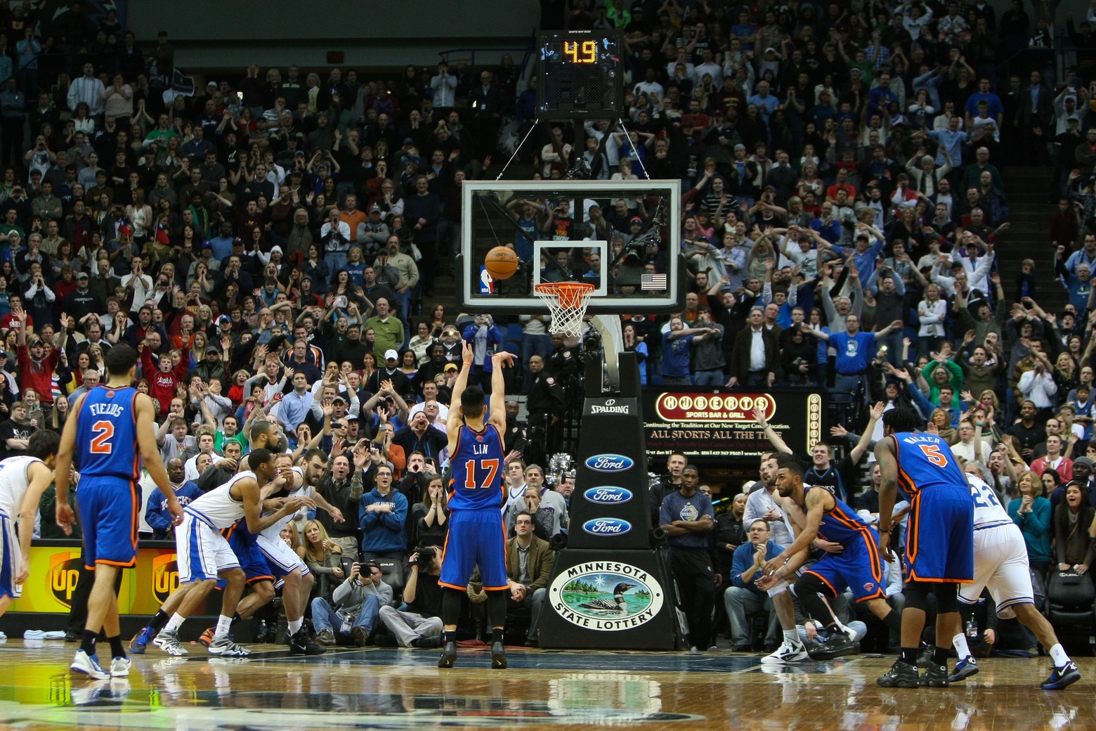 New York Knicks guard Jeremy Lin (17) makes the game-winning free throw during the fourth quarter against the Minnesota Timberwolves at the Target Center. The Knicks defeated the Timberwolves 100-98.