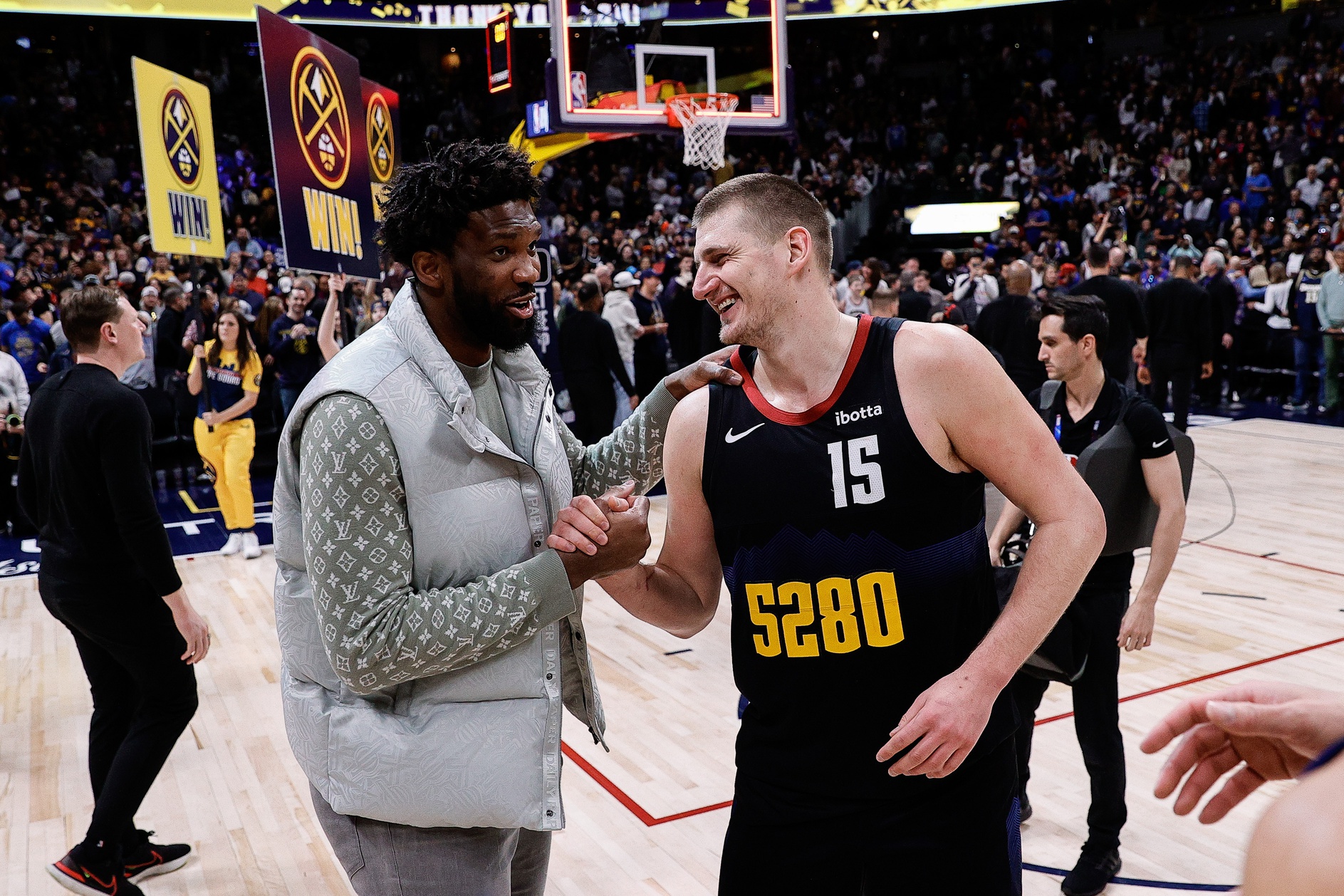 Philadelphia 76ers MVP Joel Embiid greets Denver Nuggets MVP Nikola Jokic
