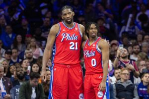 Philadelphia 76ers guard Tyrese Maxey, 2024 NBA Most Improved Player of the Year, alongside teammate Joel Embiid