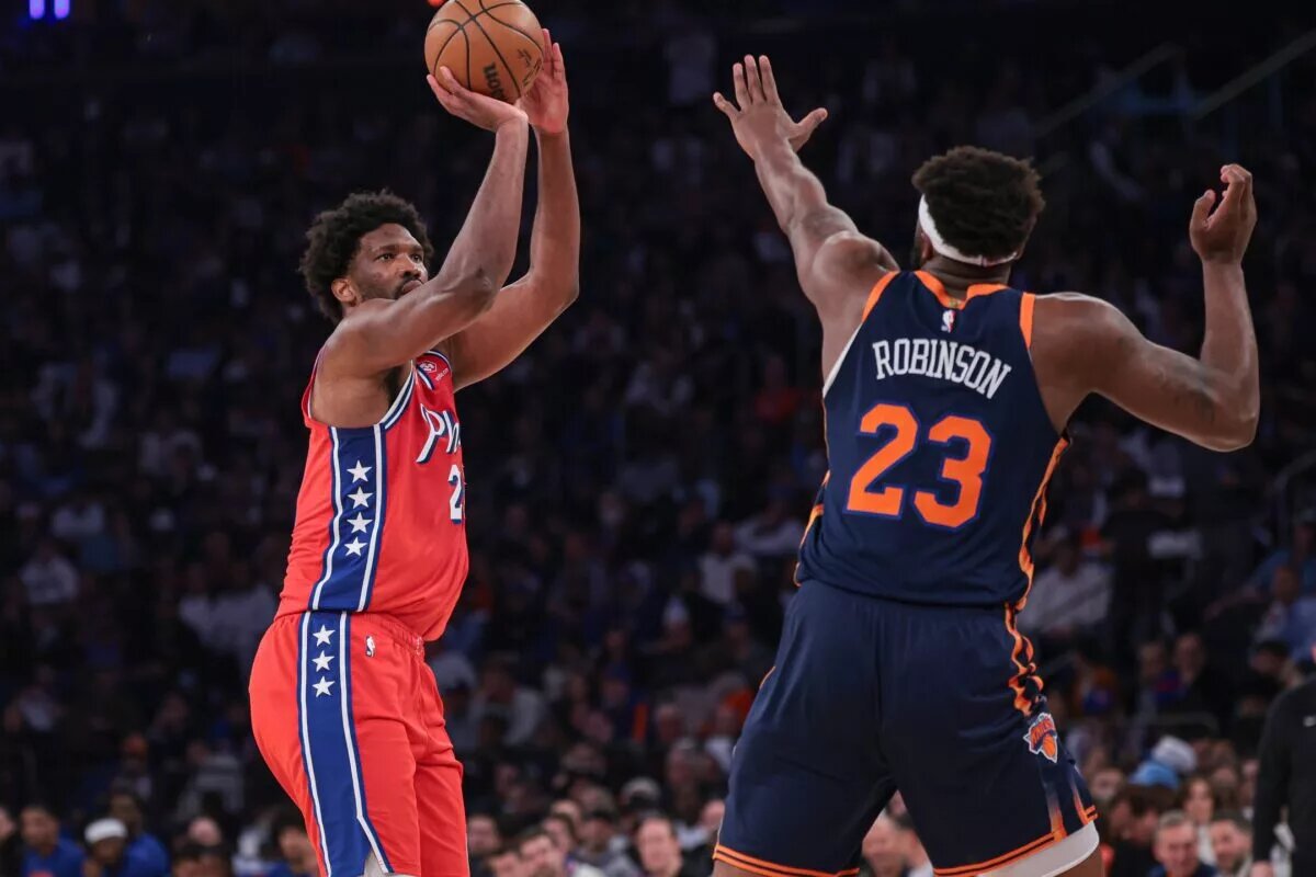 New York Knicks center Mitchell Robinson and Philadelphia 76ers center Joel Embiid, limited by injury