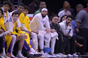 Los Angeles Lakers star LeBron James surrounded by teammates