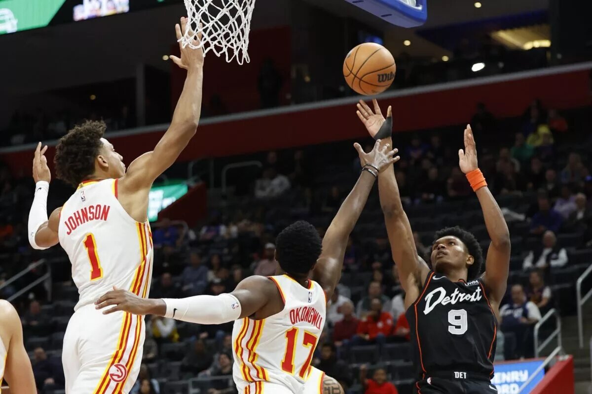 Atlanta Hawks defenders Jalen Johnson and Onyeka Okongwu, now out with injury