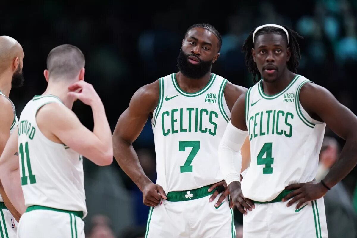 Feb 1, 2024; Boston, Massachusetts, USA; Boston Celtics guard Jrue Holiday (4), guard Jaylen Brown (7), guard Payton Pritchard (11) and guard Derrick White (9) on the court against the Los Angeles Lakers in the second half at TD Garden. Mandatory Credit: David Butler II-USA TODAY Sports
