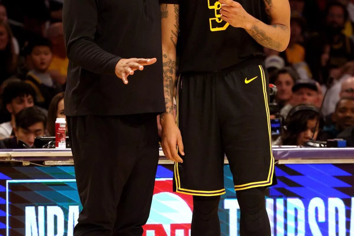 Los Angeles Lakers head coach Darvin Ham talks to forward Anthony Davis (3) during the fourth quarter against the Denver Nuggets at Crypto.com Arena.
