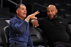 Mar 22, 2024; Los Angeles, California, USA; On the left Los Angeles Lakers general manager Rob Pelinka talks with head coach Darvin Ham (right) prior to the game against the Philadelphia 76ers at Crypto.com Arena. Mandatory Credit: Kiyoshi Mio-USA TODAY Sports