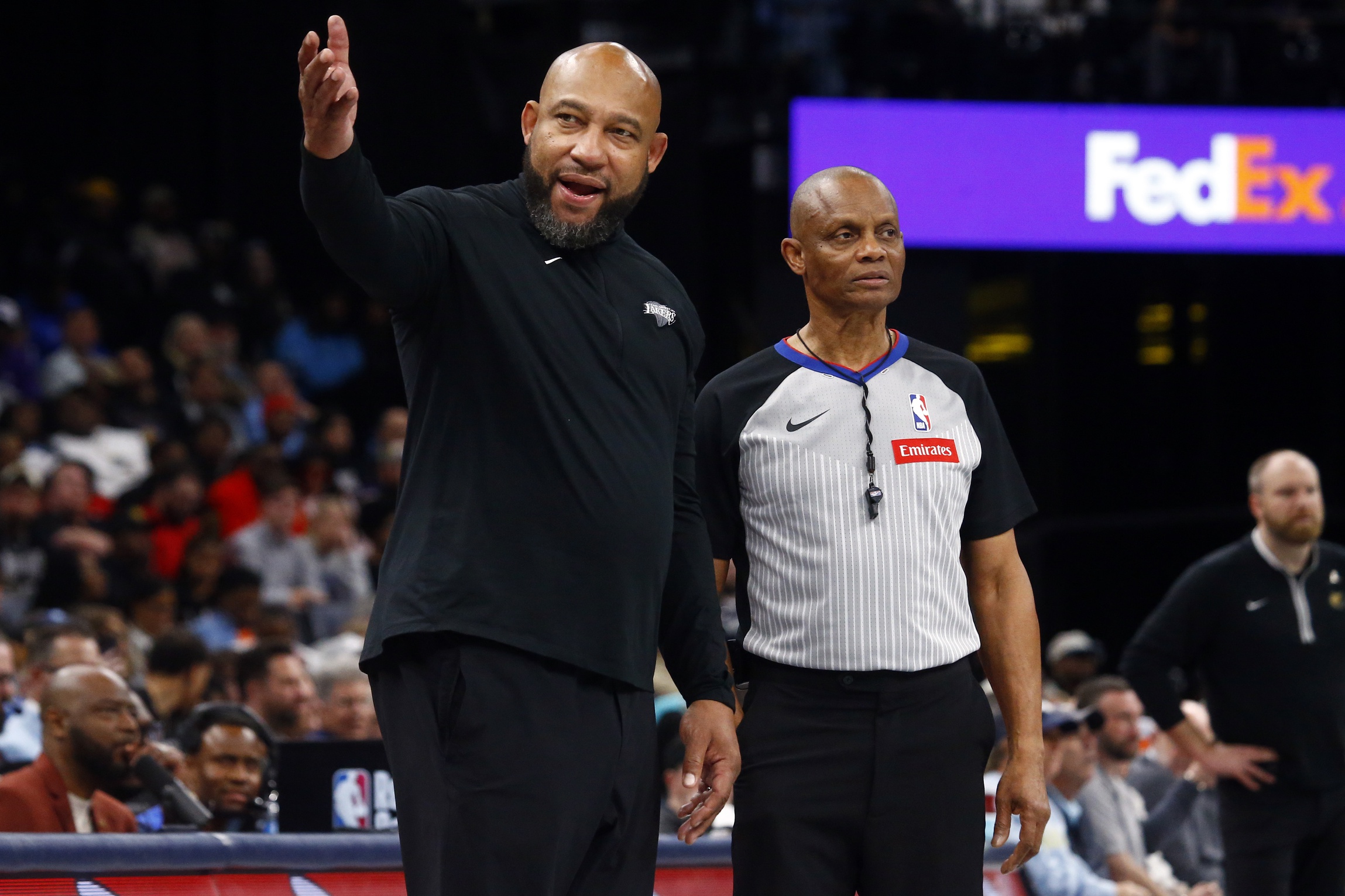 Mar 27, 2024; Memphis, Tennessee, USA; Los Angeles Lakers head coach Darvin Ham reacts toward an official after a foul call during the second half against the Memphis Grizzlies at FedExForum. Mandatory Credit: Petre Thomas-USA TODAY Sports