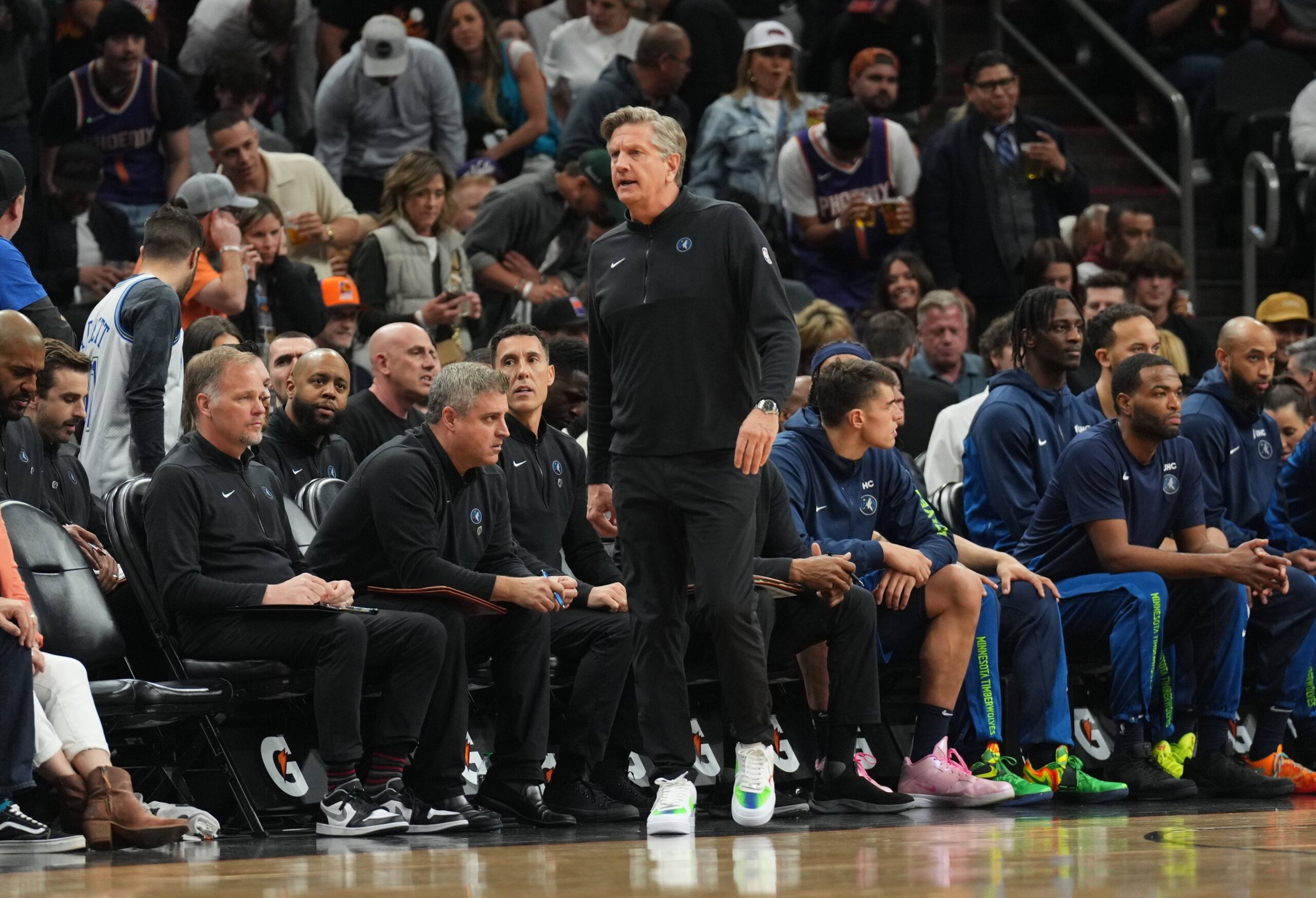 Apr 5, 2024; Phoenix, Arizona, USA; Minnesota Timberwolves head coach Chris Finch looks on against the Phoenix Suns during the first half at Footprint Center. Mandatory Credit: Joe Camporeale-USA TODAY Sports