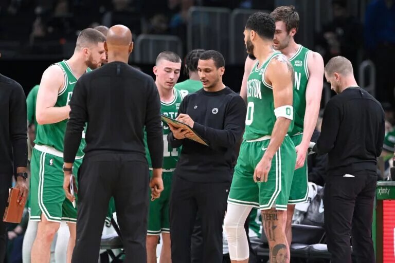 Apr 5, 2024; Boston, Massachusetts, USA; Boston Celtics head coach Joe Mazzulla works with the team during a timeout during the first half against the Sacramento Kings at TD Garden. Mandatory Credit: Eric Canha-USA TODAY Sports