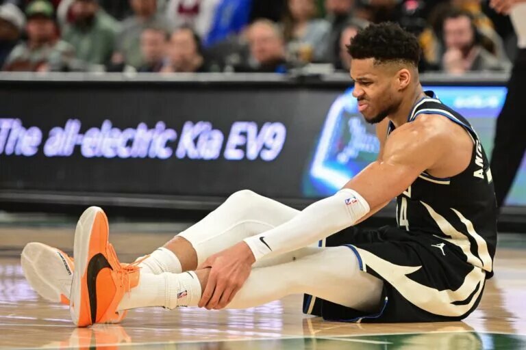 Milwaukee Bucks forward Giannis Antetokounmpo goes down with calf and Achilles injury