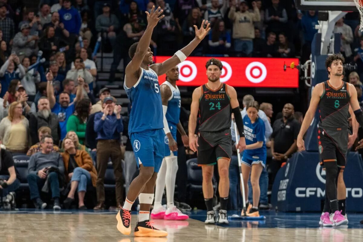 Minnesota Timberwolves guard Anthony Edwards (5) celebrates scoring a career high 51 points against the Washington Wizards in the fourth quarter at Target Center.