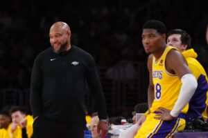 Apr 9, 2024; Los Angeles, California, USA; Los Angeles Lakers coach Darvin Ham (left) and forward Rui Hachimura (28) react after the game in the first half at Crypto.com Arena. Mandatory Credit: Kirby Lee-USA TODAY Sports