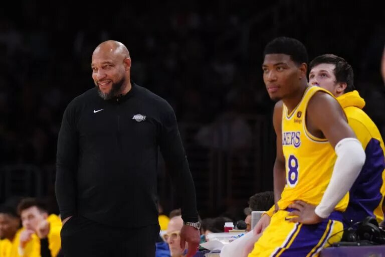 Apr 9, 2024; Los Angeles, California, USA; Los Angeles Lakers coach Darvin Ham (left) and forward Rui Hachimura (28) react after the game in the first half at Crypto.com Arena. Mandatory Credit: Kirby Lee-USA TODAY Sports